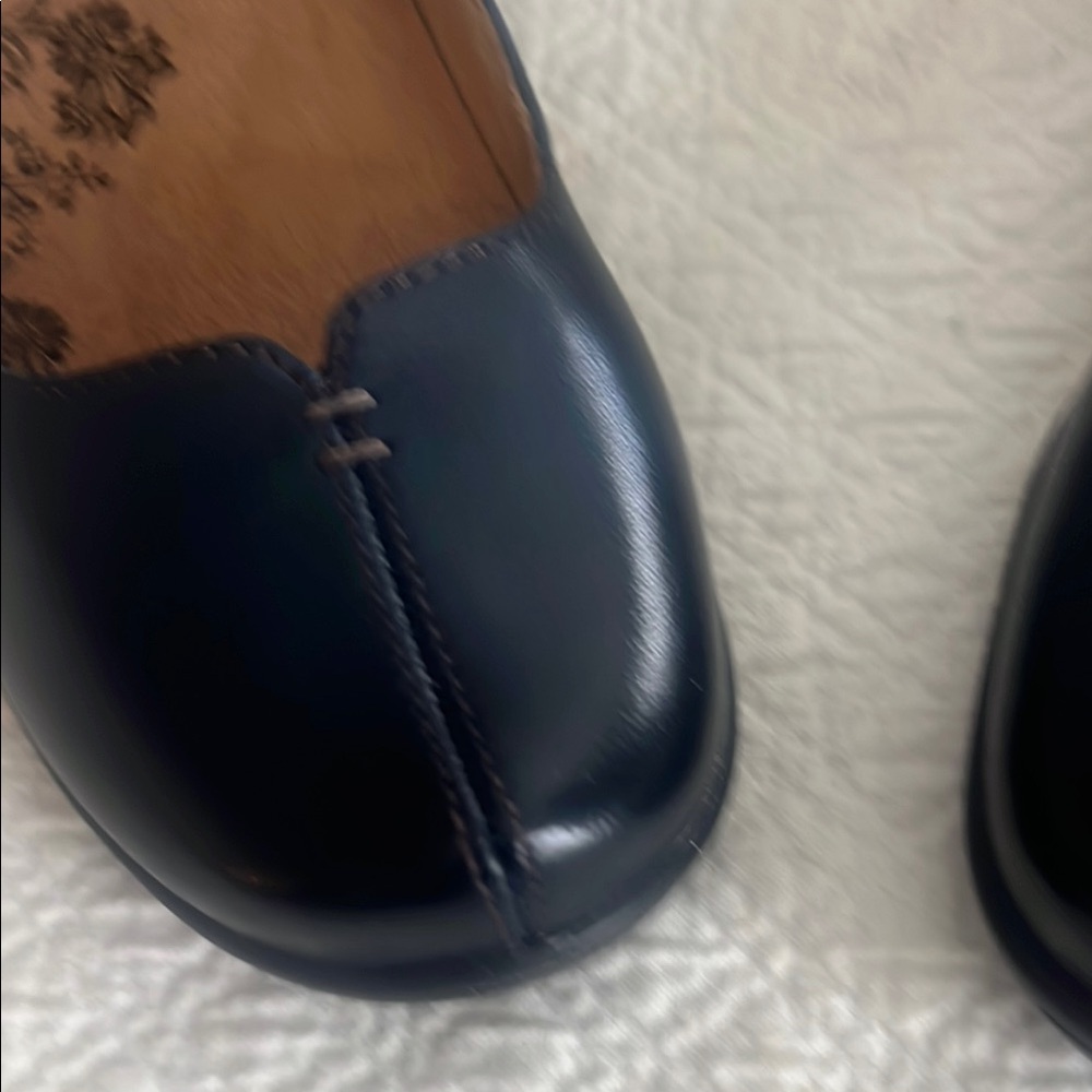 Navy Taos shoes.   Brand new